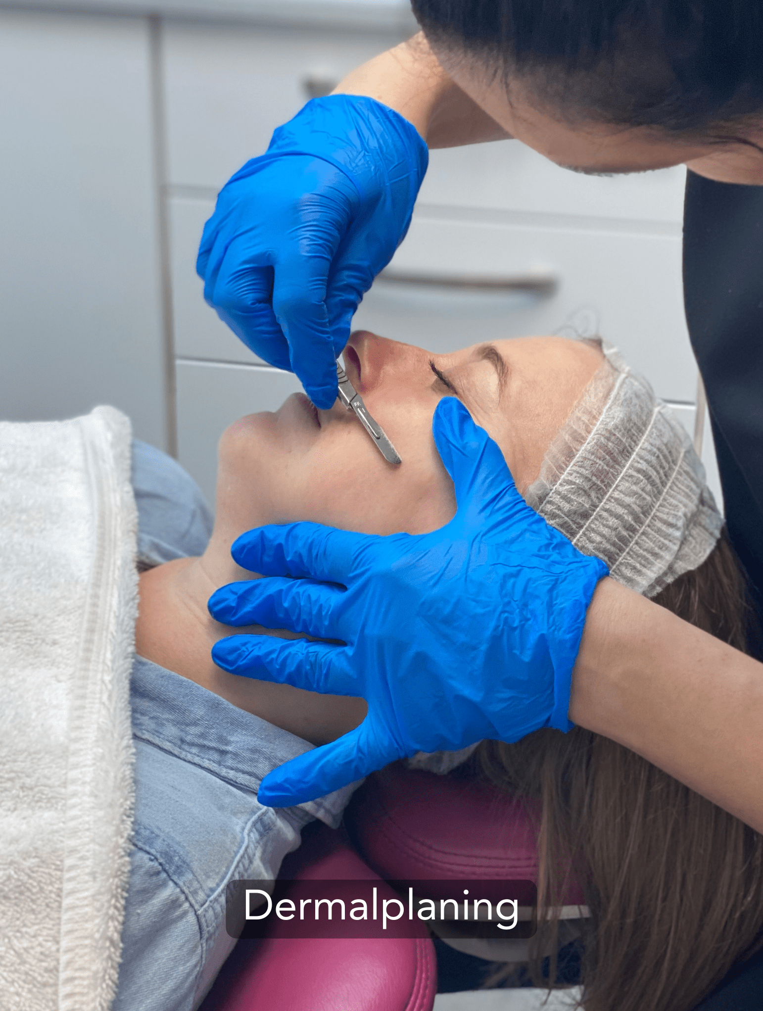 Dermaplaning treatment being performed